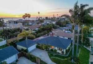 an aerial view of a house with palm trees at CB-5515 - Walk to Beach - Private Hot Tub - Ideal Location in Carlsbad