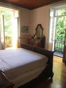 เตียงในห้องที่ Casa della Gioia - Appartamento Due Balconi