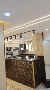 Кухня или кухненски бокс в fantastic new modern apartment شقة مميزة في قلب المهندسين قريبة من النيل
