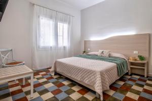 Postel nebo postele na pokoji v ubytování Casa Rosmarino