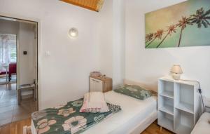 Postel nebo postele na pokoji v ubytování Villa Dora Crikvenica ##