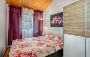 Postel nebo postele na pokoji v ubytování Villa Dora Crikvenica ##