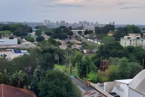 a view of a city from the roof of a building at Residencial Dona Odila - Excelente Localização in Foz do Iguaçu