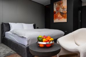מיטה או מיטות בחדר ב-Morea Hotel