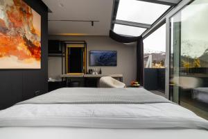 Cama ou camas em um quarto em Morea Hotel