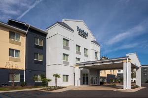 a white hotel with a sign on the front of it at Fairfield Inn & Suites by Marriott Mobile Daphne/Eastern Shore in Spanish Fort