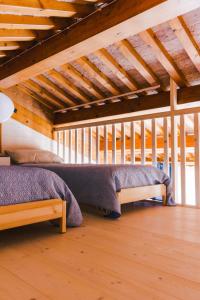 Posteľ alebo postele v izbe v ubytovaní b&b al fienile + 23 fotografií