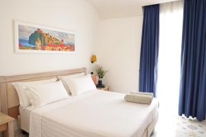 Postel nebo postele na pokoji v ubytování Hotel Terme Oriente - Beach & SPA