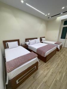 Postel nebo postele na pokoji v ubytování Hola Cairo Boutique