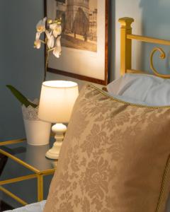 A bed or beds in a room at Affittacamere Firenze in Libertà Parterre