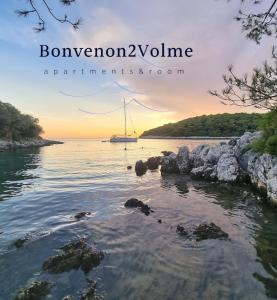 a view of a body of water with a sail boat at Bonvenon2Volme Apt&Room in Pula