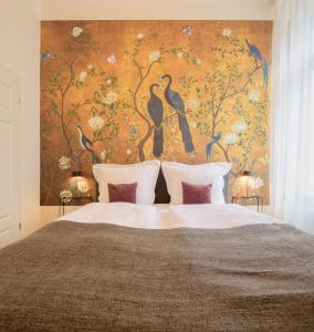 Ένα ή περισσότερα κρεβάτια σε δωμάτιο στο Boardinghouse Luise 5