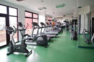 a gym with a row of treadms and elliptical machines at Sea View Luxury 1-bd Apartment Marina Cape Aheloy in Aheloy