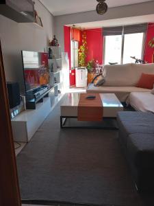 a living room with a couch and a coffee table at Castellón in Castellón de la Plana