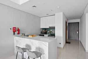 مطبخ أو مطبخ صغير في Spacious and Cozy Apartment