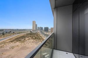 an office building with a view of the beach at Spacious and Cozy Apartment in Dubai