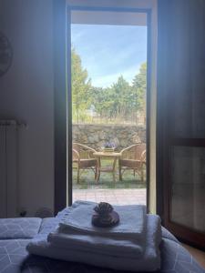 Posteľ alebo postele v izbe v ubytovaní le piccole sorgenti