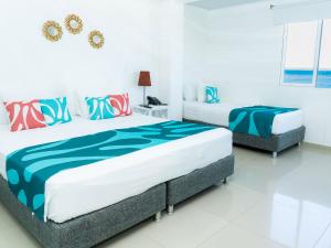 Hotel Caribbean Coral客房内的一张或多张床位