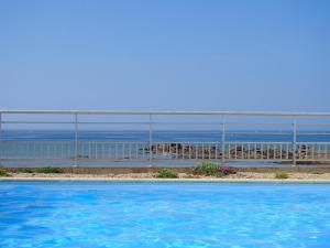 Πισίνα στο ή κοντά στο Appartement les pieds dans leau accès direct sur la côte sauvage - 2 pers