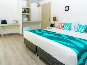 Hotel Caribbean Coral客房内的一张或多张床位