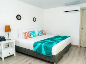 Hotel Caribbean Coral客房内的一张或多张床位