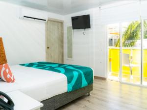 Hotel Caribbean Coral客房内的一张或多张床位