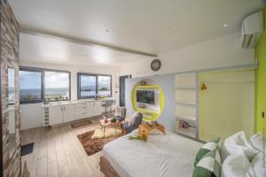 Rúm í herbergi á Chalet étoilé BAYALOCATION