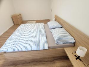 Ein Bett oder Betten in einem Zimmer der Unterkunft Apartmán Neva Šaľa