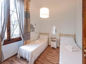 A bed or beds in a room at Affittacamere Firenze in Libertà Parterre
