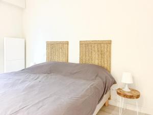 Posteľ alebo postele v izbe v ubytovaní Villa Bastion Arago à deux pas de la Grande Plage des Sables - 8 pers