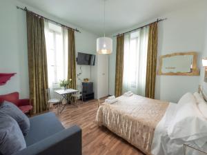 A bed or beds in a room at Affittacamere Firenze in Libertà Parterre