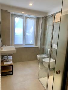 Koupelna v ubytování Hotel Locanda Alla Perla