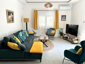 Χώρος καθιστικού στο Rematia Cosy Apartment