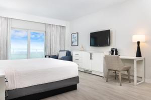 Postel nebo postele na pokoji v ubytování Ocean Place Resort & Spa + 36 fotografií