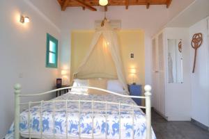 En eller flere senger på et rom på Icon Painter Villa 'Agia Triada 1'