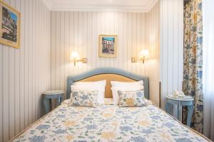 Postel nebo postele na pokoji v ubytování Swiss Hotel