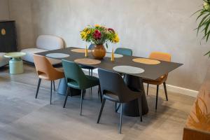 Area soggiorno di Hematian Hotel by Effy