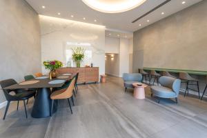 Area soggiorno di Hematian Hotel by Effy