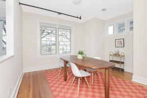 a dining room with a wooden table and chairs at Fun & Funky 2BR in Downtown Princeton in Princeton