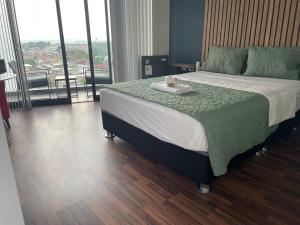 Voodi või voodid majutusasutuse Tarapoto central suites toas