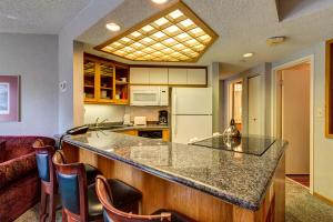 A kitchen or kitchenette at Beaver Run Resort 4237 by Great Western Lodging