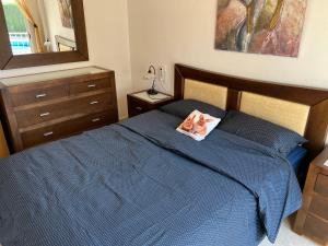 A bed or beds in a room at First Line Cabo Roig Orihuela Costa