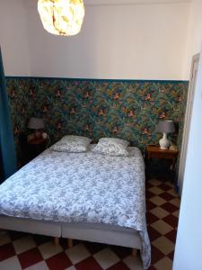 Postel nebo postele na pokoji v ubytování Maison Auctoire