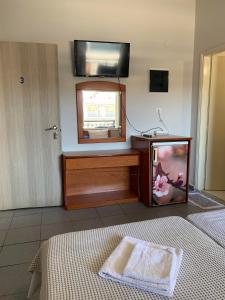 Postel nebo postele na pokoji v ubytování GR Apartments Sea View