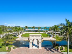 a monument in a park with palm trees and a body of water at 3/2 Close to Beach Pet Friendly in Fort Pierce