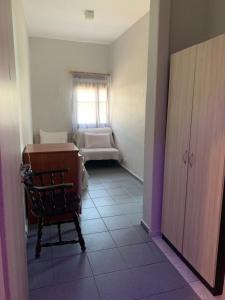 Postel nebo postele na pokoji v ubytování GR Apartments Sea View