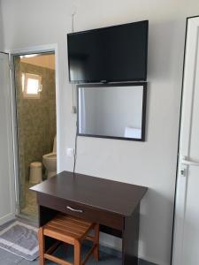 TV a/nebo společenská místnost v ubytování GR Apartments Sea View + 30 fotografií