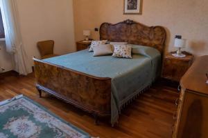 Ένα ή περισσότερα κρεβάτια σε δωμάτιο στο Agriturismo Pino Argentato