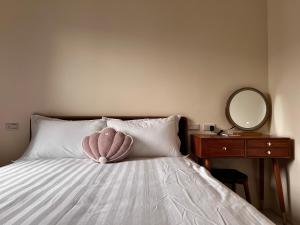 Postel nebo postele na pokoji v ubytování Do Sui Homestay