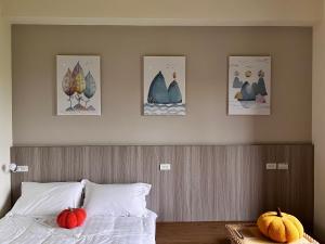 Postel nebo postele na pokoji v ubytování Do Sui Homestay